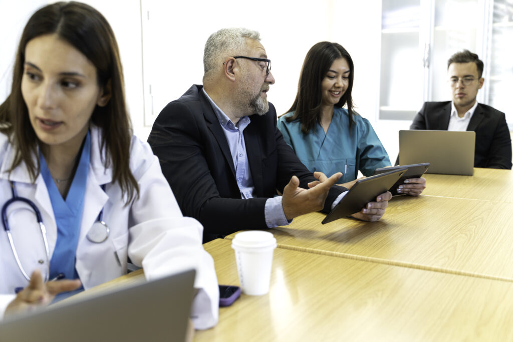 Physician reviewing checklist for starting a medical practice