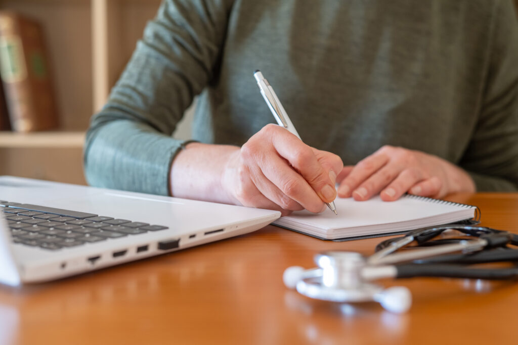 Physician reviewing startup plan for independent medical practice